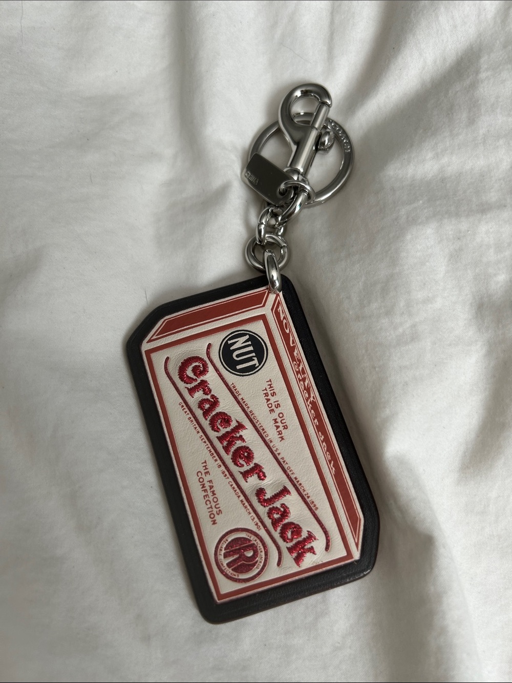 Cracker Jack Red and Black Phone Keychain Accessory